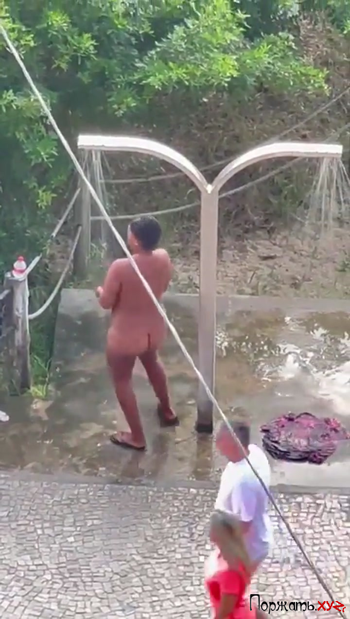 Careless Woman Takes A Shower In Public